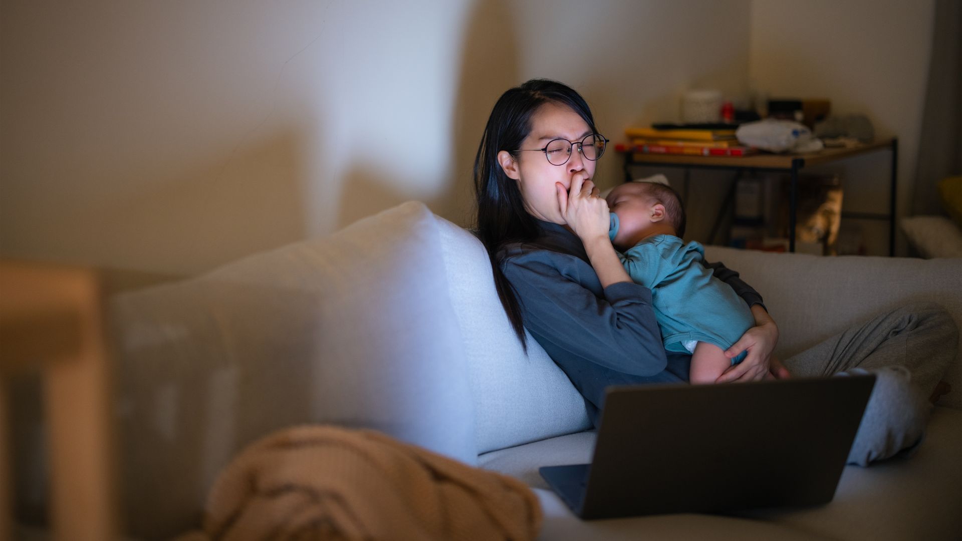 sleep deprived mom yawning