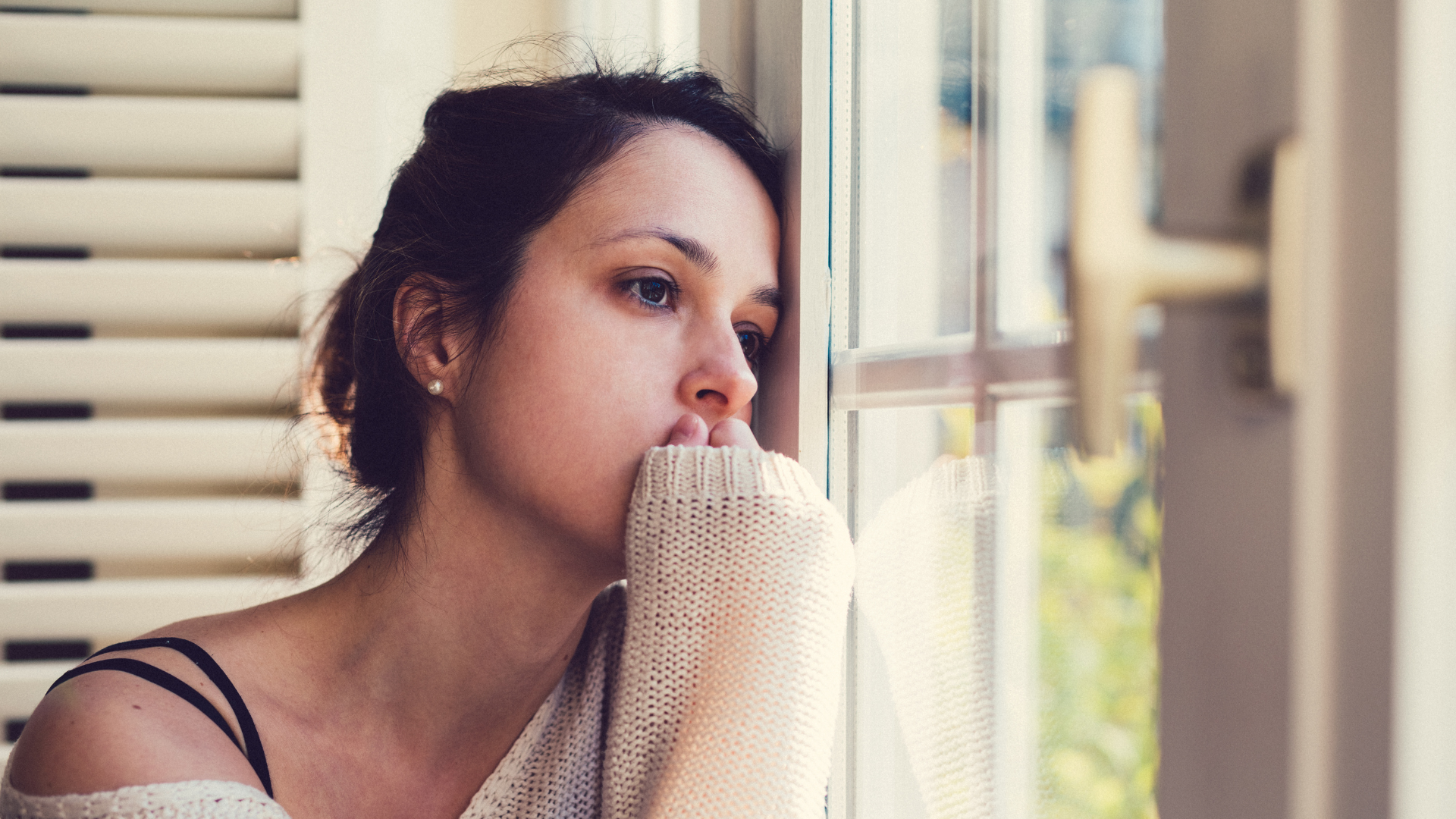 An Image showing a depressed woman